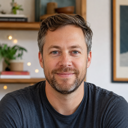Portrait of Mark, a parent doing crafts with his child